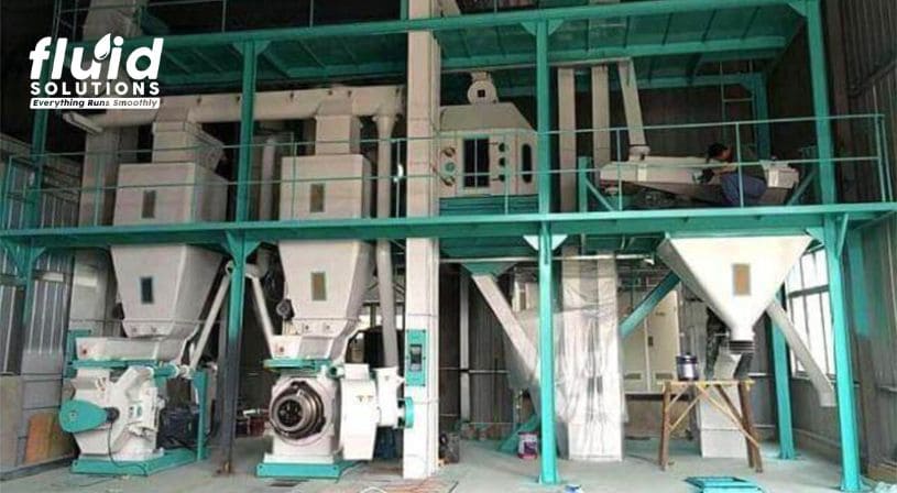 Large machinery setup in a feed mill plant.