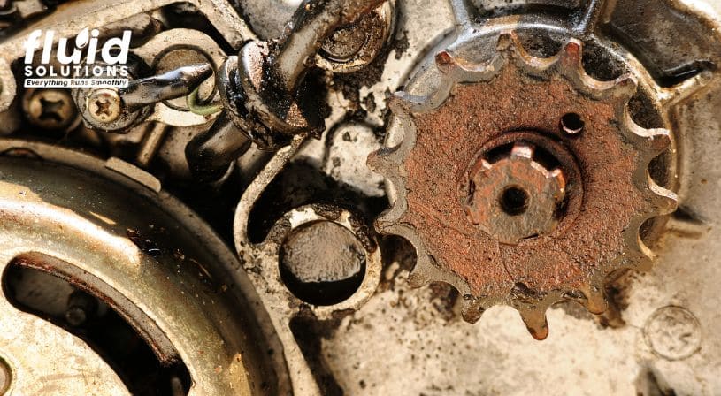 Rusty gear component with signs of heavy corrosion.