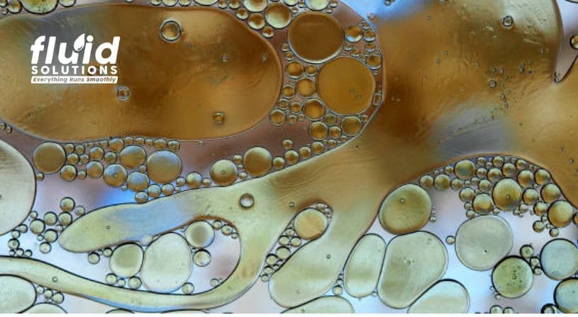 Oil and water bubbles creating a mixed fluid pattern.