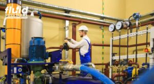 Industrial lubrication solutions with technician monitoring fluid systems and equipment