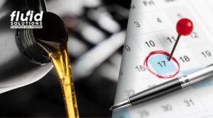 Oil pouring next to marked calendar date