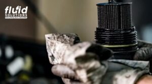 Cleaning oil filter with cloth