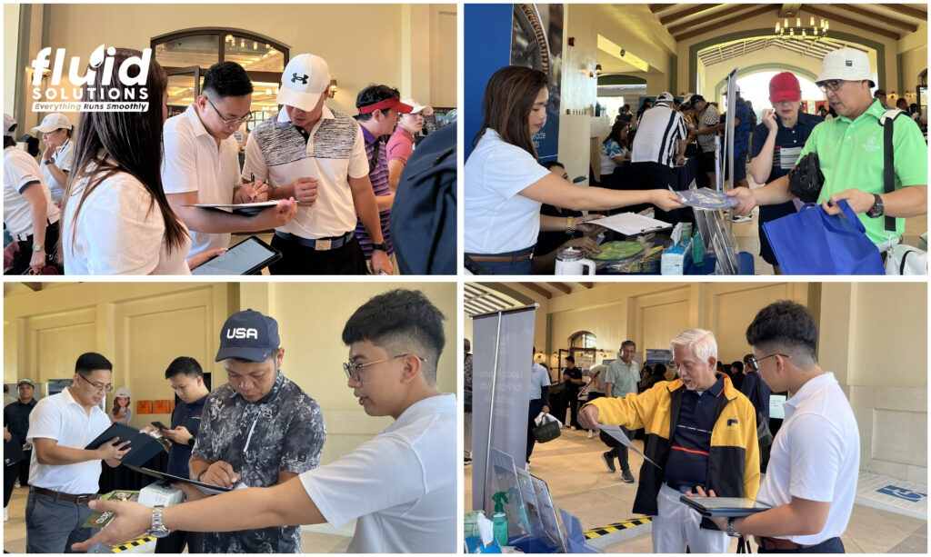 Visitors engaging with the lubrication consultants of Fluid Solutions